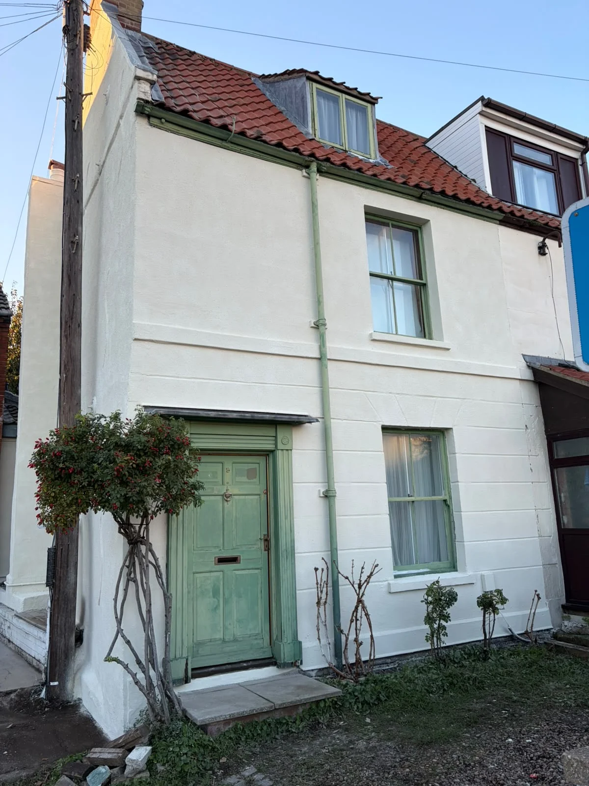 After: the Norwich property exterior finished in Antique White.